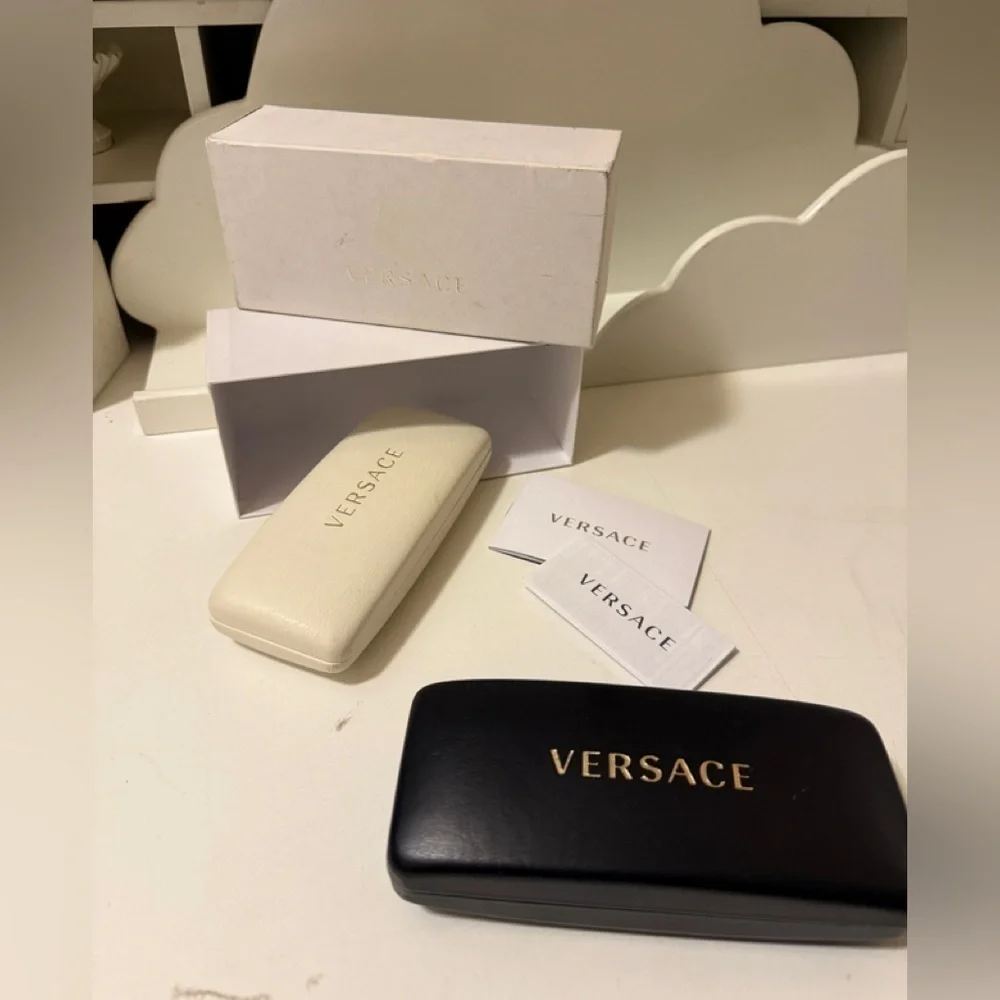 Two original Versace sunglasses case with new conditions